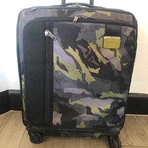 Tumi Merge Continental rolling carry-on suitcase